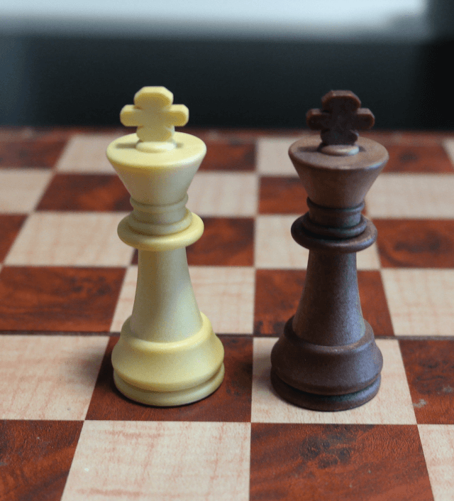 King Chess Pieces on a Chess Board